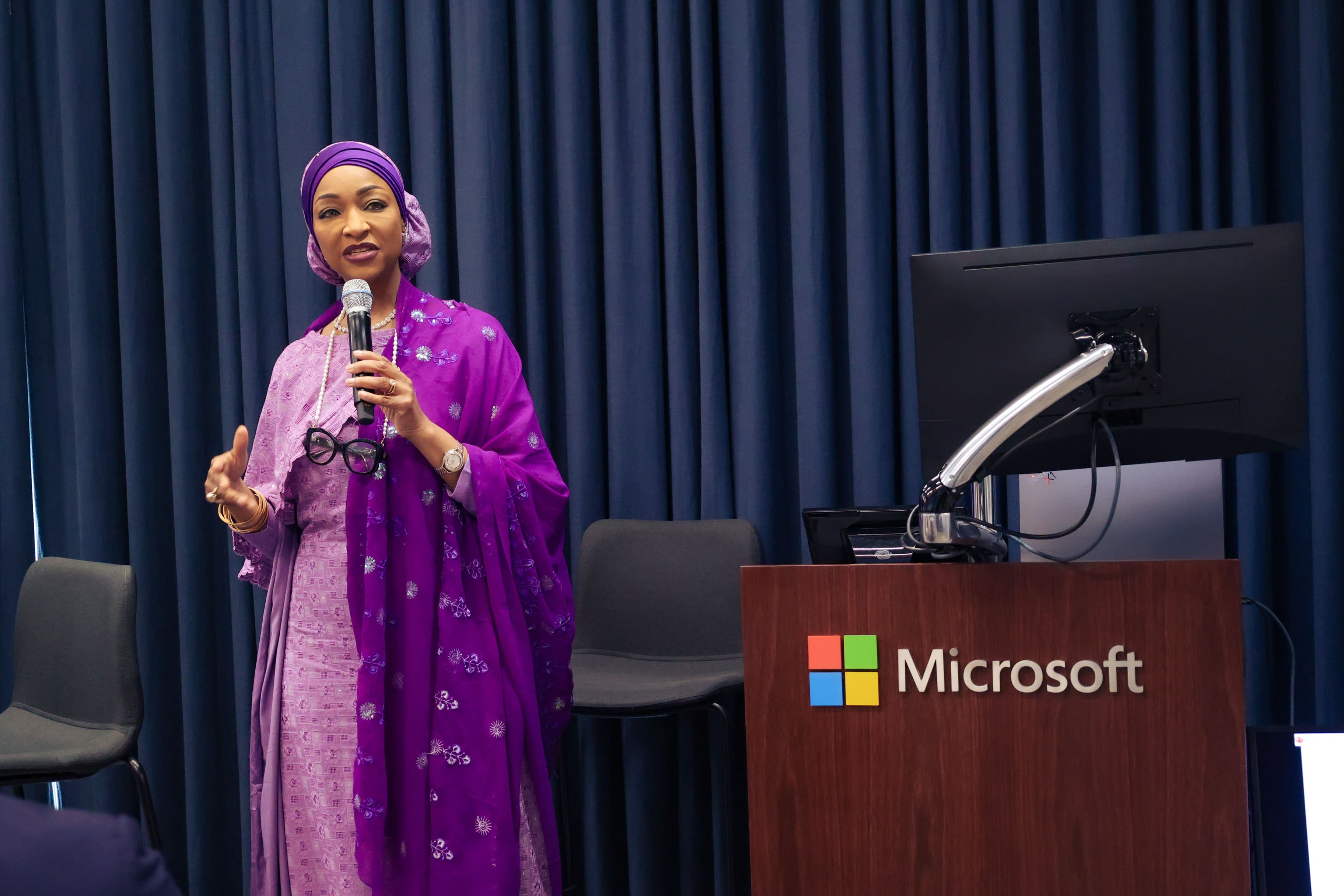 Minister speaking at podium